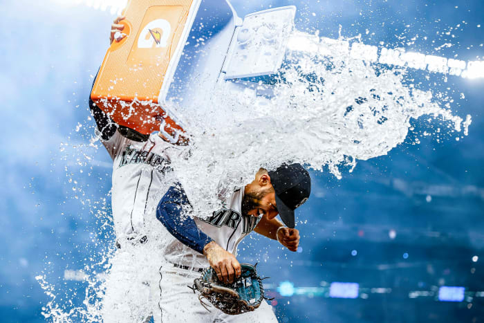 Abraham Toro gets dosed with a cooler of water after hitting a game-winning grand slam off Astros reliever Kendall Graveman on Aug. 31. The Mariners traded Graveman for Toro just over a month earlier.
